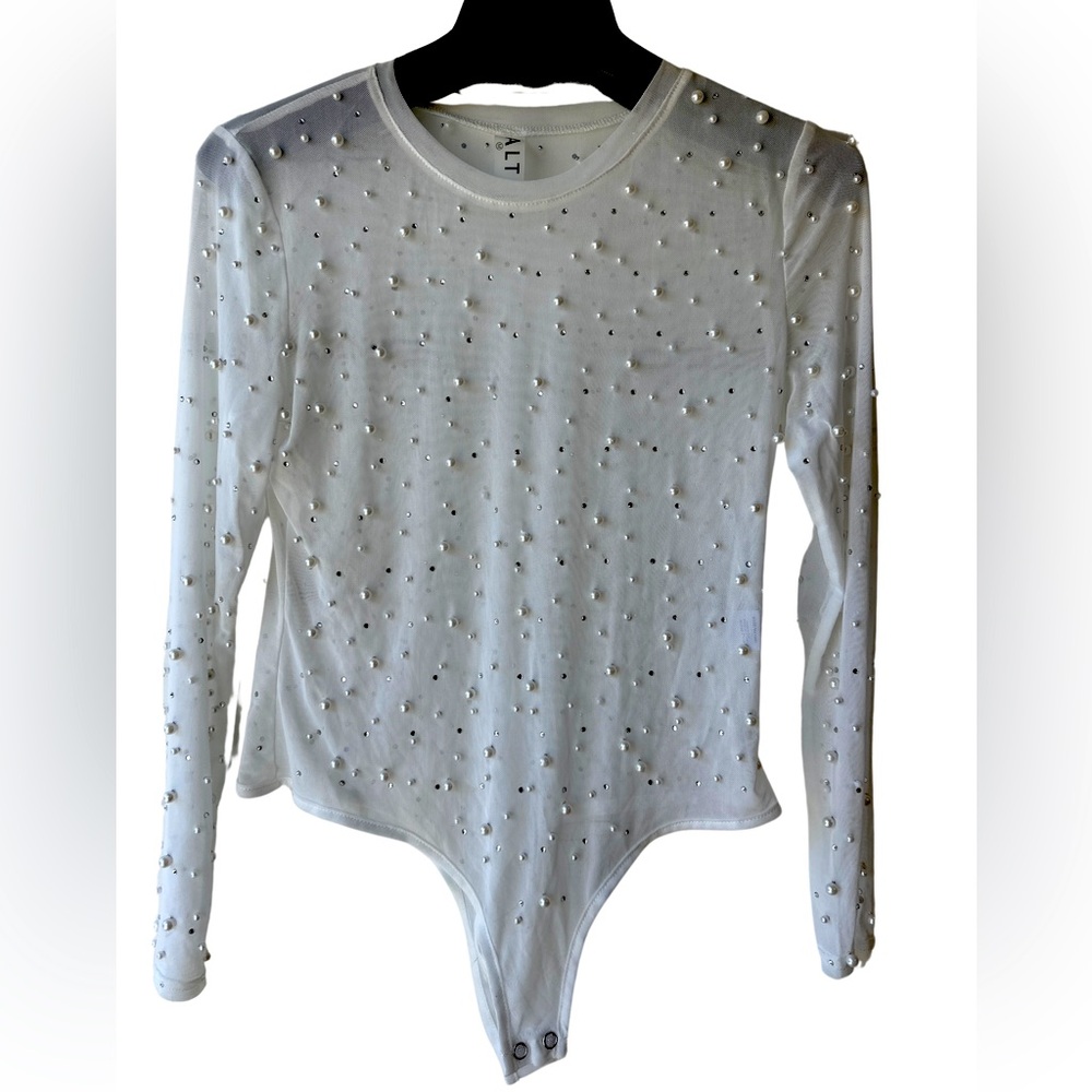 White mesh bodysuit with pearls.